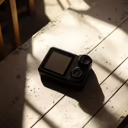 the small, compact computer is resting on the table