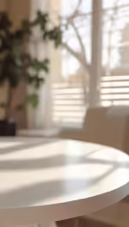 a white table in front of some chairs
