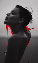 a woman with red tape around her neck