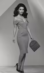 a woman holding a purse and wearing a dress