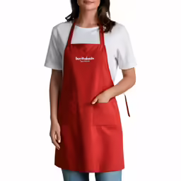 a woman in a red apron