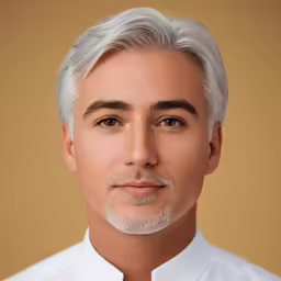 a close up photo of an older man in a dress shirt and tie