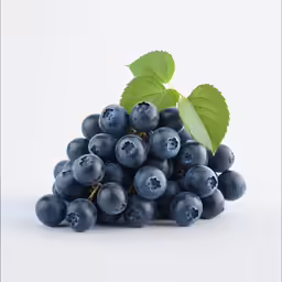 a group of blueberries sit next to each other on a white surface
