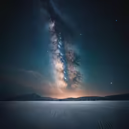 a dark sky with a few stars near the horizon