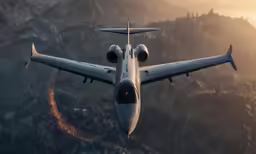 the large propeller plane is flying near the mountain