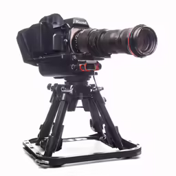 the camera is mounted on top of a tripod