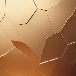 a metal surface with a golden design on it
