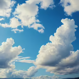 a person on the beach flying a kite under a cloud filled sky