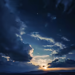 a dark sky with clouds and bright sun behind it