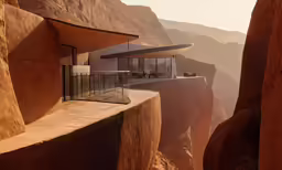 a house in a cliff looking out over mountains
