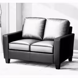 a couch with some pillows and a vase on the table
