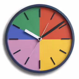 a multi - colored clock is on the wall with black hands