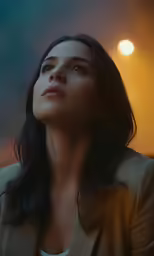 woman in business suit staring off into the distance
