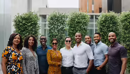 a group of people pose for the camera