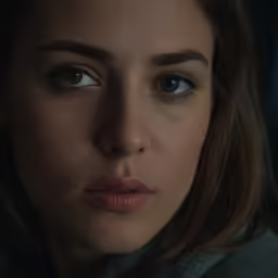 a closeup of a woman with blue eyes