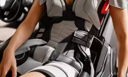 the woman is in an adjustable chest armor