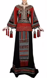 a woman in a colorful dress is standing