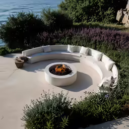 there is a very large white fire pit outside