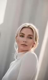 an image of a woman that is wearing white