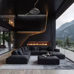 a living room with an oversized sectional sofa and fireplace