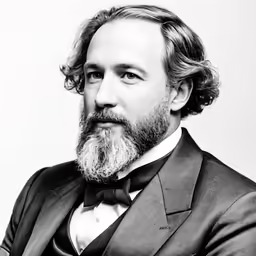 an old black and white photo of a man with a beard
