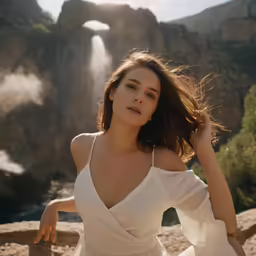 the beautiful woman wearing white clothing is posing for a picture