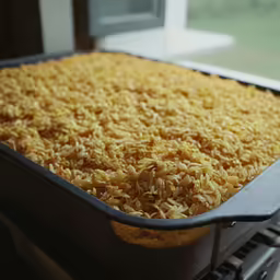 an uncooked dish is on the oven cooking