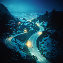 a long way with a mountain and street light on