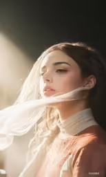 an asian woman wearing long veils in the sun