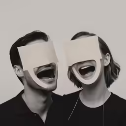 two people with masks covering their faces