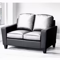 a modern couch with some pillows in a room