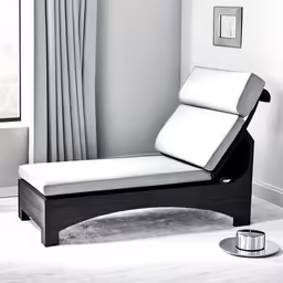 a modern couch sitting in front of a window