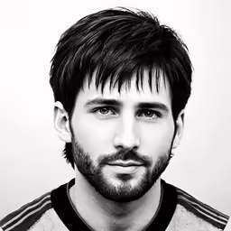 a close up of a person wearing a black and white image