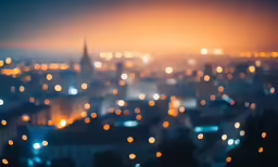the night view of city lights and the building is all blurry