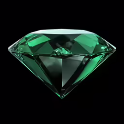 an emerald colored diamond on black background