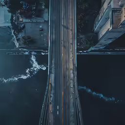 an aerial view of traffic on a highway in the night