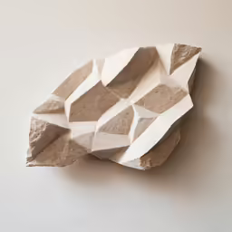 a paper sculpture made out of clay