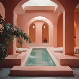 a person is sitting in the middle of the bathtub area