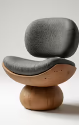 a chair with an extended ottoman on top