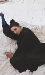 there is a woman that is laying down