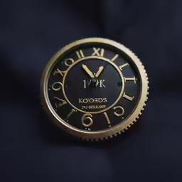 a very attractive looking watch sitting on top of a table
