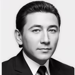 an official black and white photo of a man in a suit