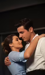 two people that are hugging in the dark