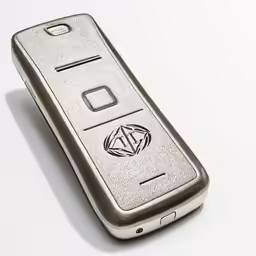 the silver cell phone has an interesting logo on the back of it