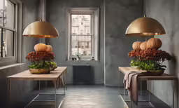 a couple of tables with plants and some lights on top
