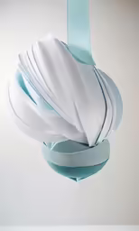 an ornament made out of blue and white material