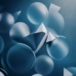 some paper balls and a paper kite on a blue background