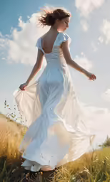 a woman in a white dress walks through a grassy field