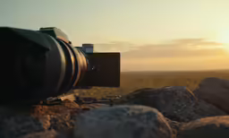 a camera that is sitting on some rocks
