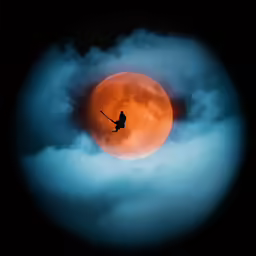 a person in the dark holding a pole on their head